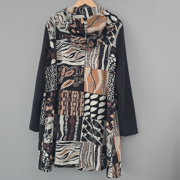 Long-sleeve, hooded asymmetrical zip-up jacket.  Patchwork design. - Picture 7 of 8